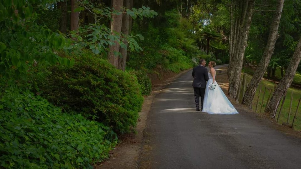 Husband and wife walking among the trees