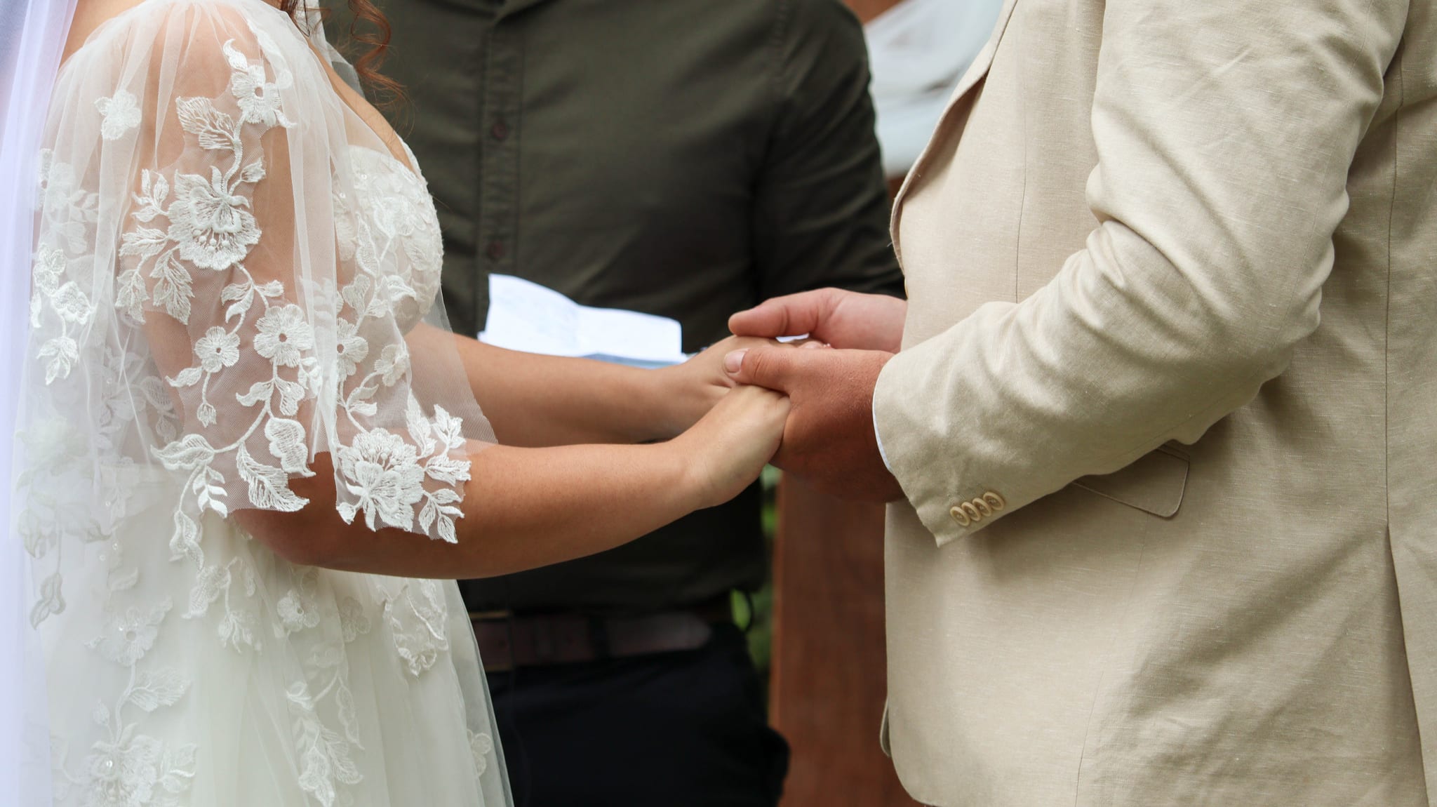 Husband and wife holding hands