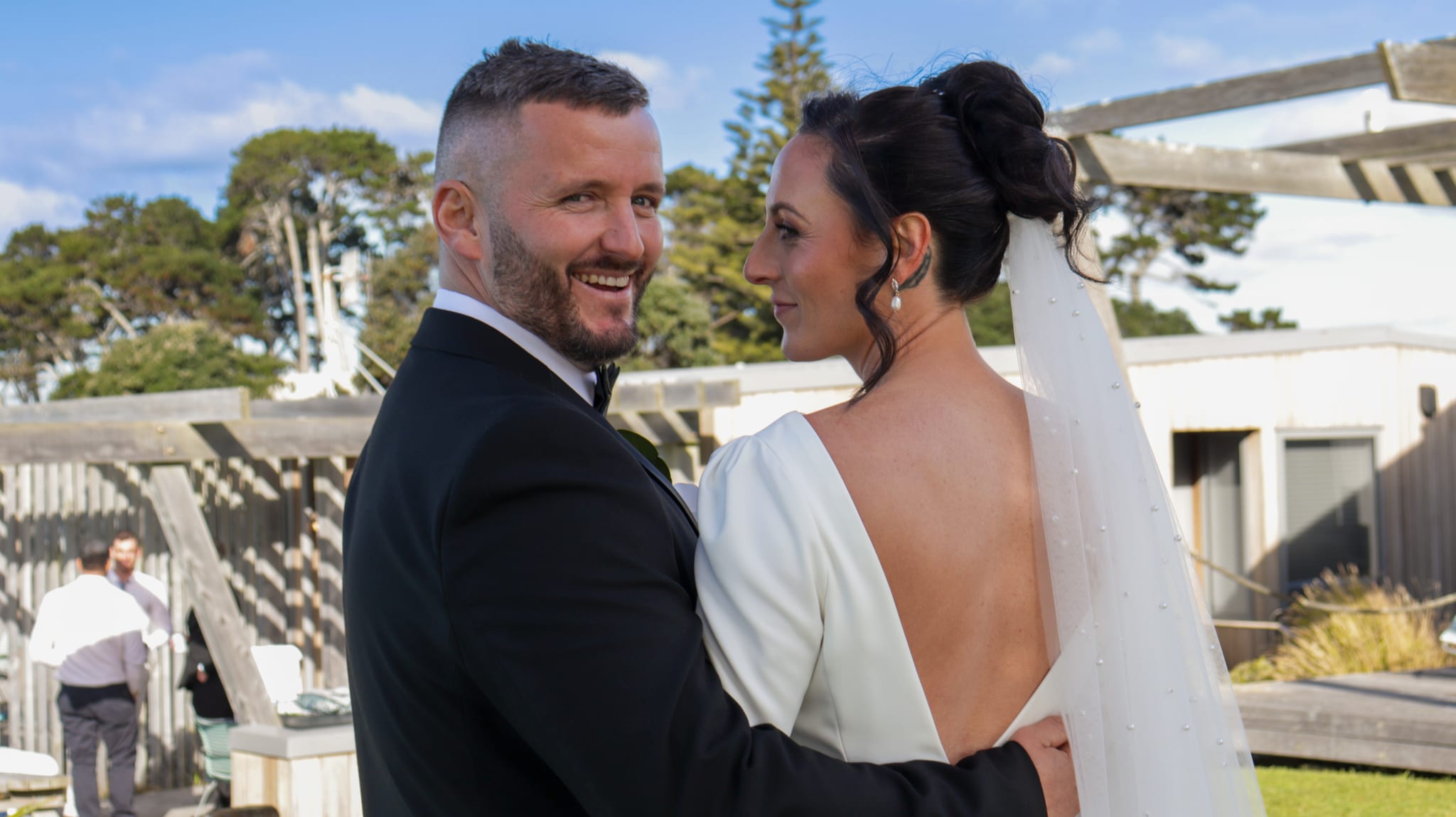 Groom look over shoulder